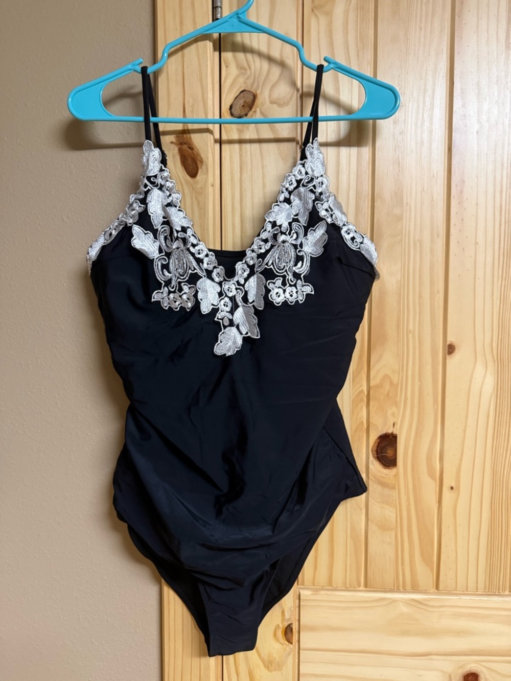 Black One-Piece Swimsuit with White Lace Appliqué